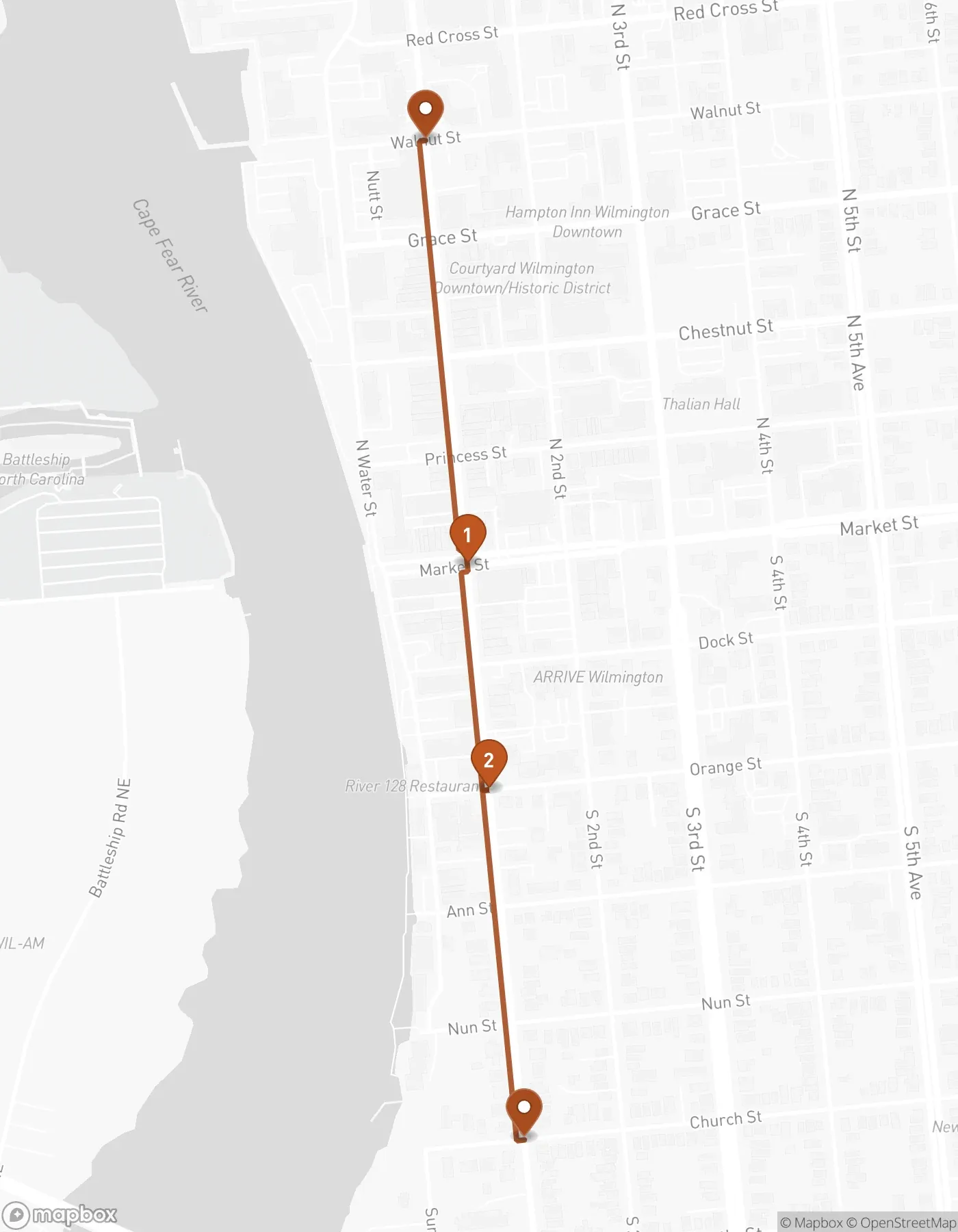 Mapbox map of the Front Street parade route from Walnut Street south past Market Street (1) and Orange Street (2) to Church Street.